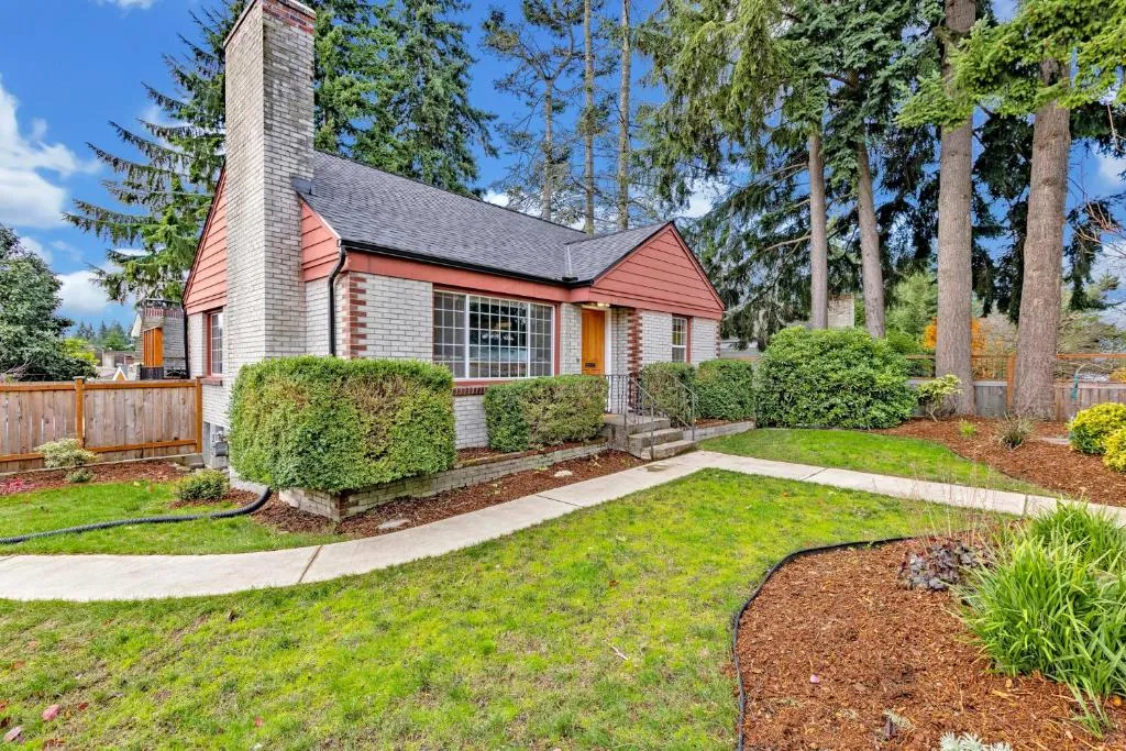 Image of Remodeled Home Fenced Yard Outdoor Fireplace