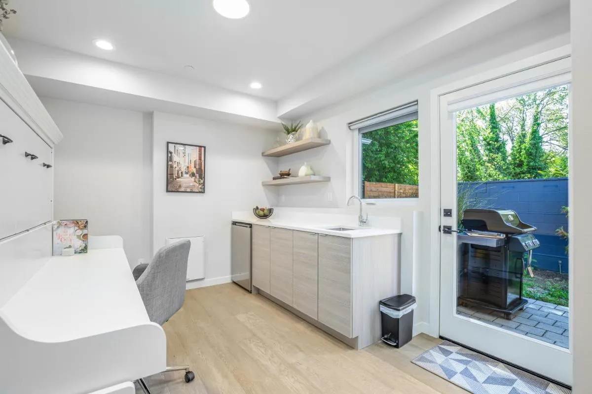 Image 2 of Rooftop Patio with Waterview, Private Garden & Grill 3BR 3BA- Modern Cityscape
