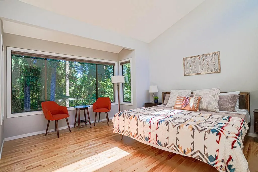 Image 1 of Sunlit contemporary Bellevue Home w a Lush Garden